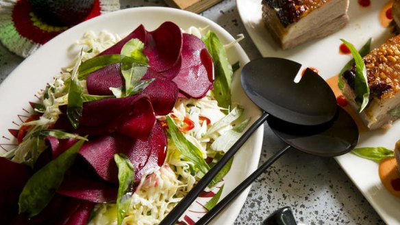 Vietnamese mint and chilli coleslaw, served with roasted pork belly (right).