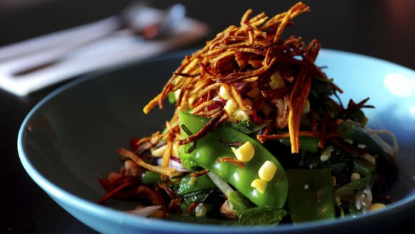 Salad of beans, corn, snow peas, cashews and sweet potato with a tamarind dressing.