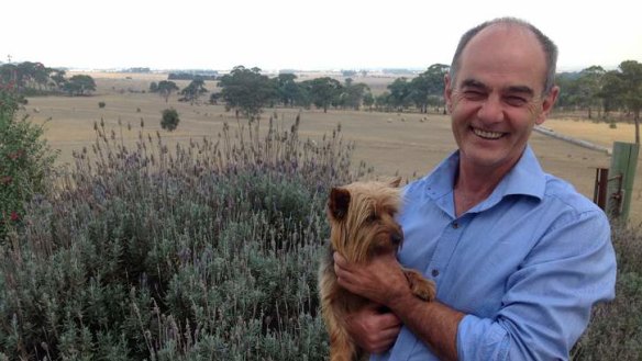 New roots: John Durham and his dog Scruff have quietly relocated from Western Australia to rural Victoria.