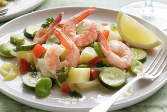 Warm spring salad with prawns and broad beans.