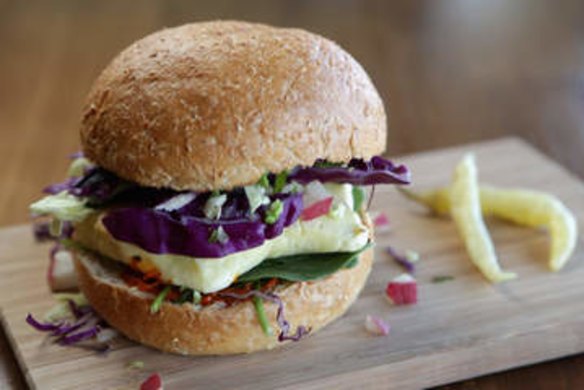 The haloumi burger is lifted by avjar relish.