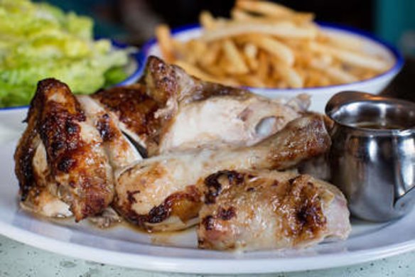 Chicken with fries and green salad.