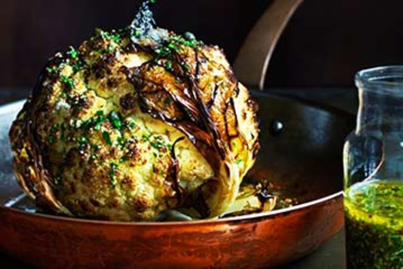 Whole roasted cauliflower with lemon and mustard dressing.