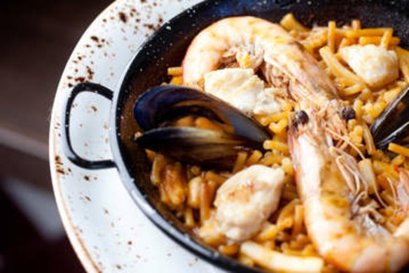 Fideua de Gandia - a traditional short noodle dish with fish, prawns and mussels at Chato.