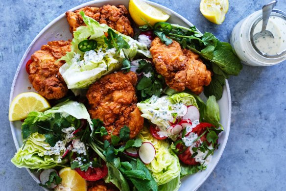 Buttermilk fried chicken cutlets with iceberg wedges, jalapeno and coriander dressing.