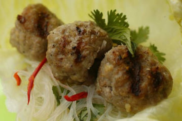 Pork balls with coriander and lettuce.