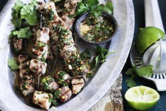 Sticky pork skewers with spiced lime dipping sauce.