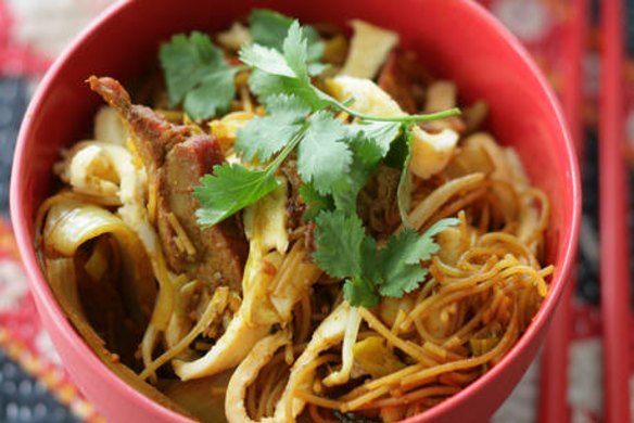 Singapore noodles. Caroline Velik CURRY recipes for Epicure. Photographed by Marina Oliphant. Food preparation and styling by Caroline Velik, red bowls from Essential Ingredient, background material from Minimax, MUST CREDIT.