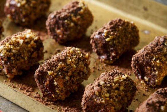 Dark chocolate, pistachio and praline truffles.