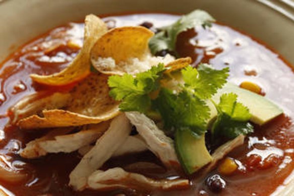 Mexican chicken soup with nachos.
