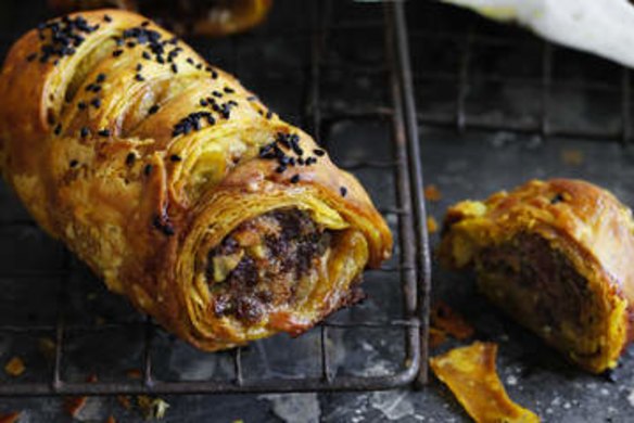 Lamb pistachio sausage rolls with turmeric pastry.