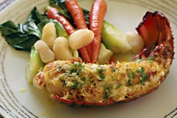 Lobster with ginger and coriander butter and stir-fried vegetables