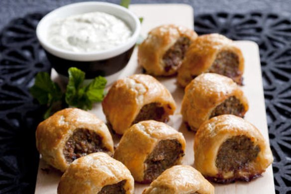 Moroccan lamb sausage rolls with yoghurt dipping sauce.