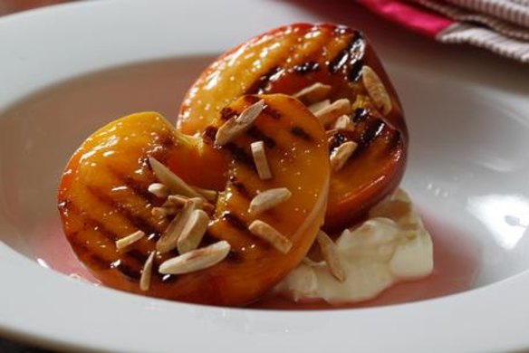 Warm peaches with creamy ricotta and rosewater syrup.