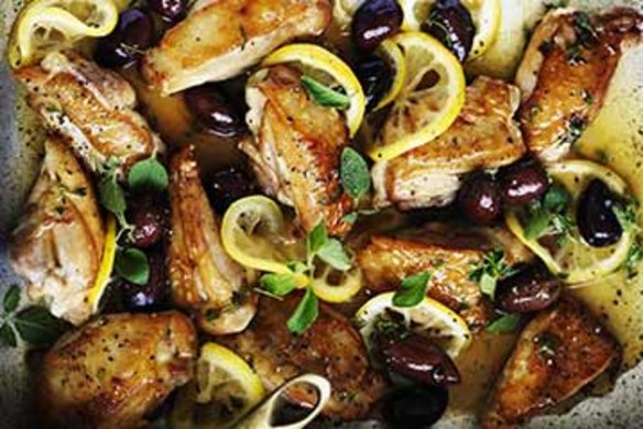 Braised chicken with lemon, oregano and olives.