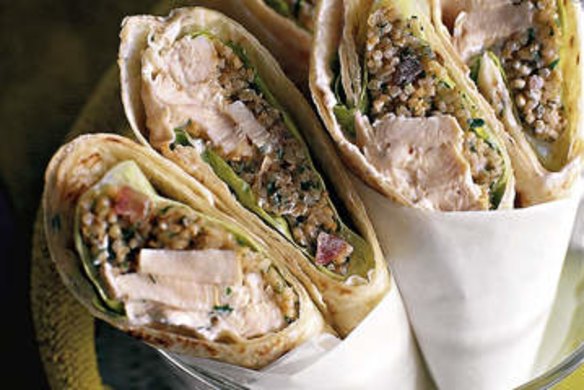 Shows spicy chicken wraps with cracked wheat and tomato salad