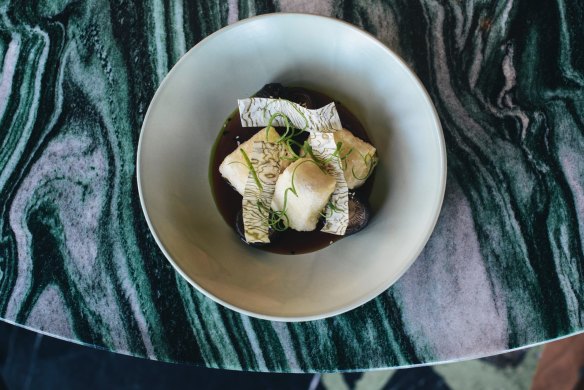 Fried tofu, pickled shiitake, bonito, soy, spring onion oil and sesame.