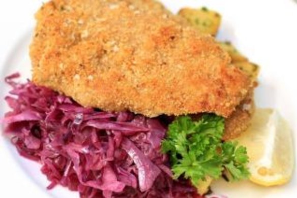 Veal schnitzel with braised cabbage.