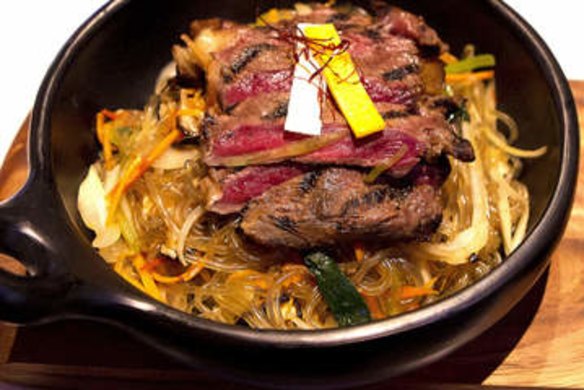Grilled beef with sweet potato noodles.