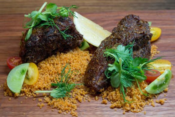 Lamb shoulder, tomatoes and cous cous.