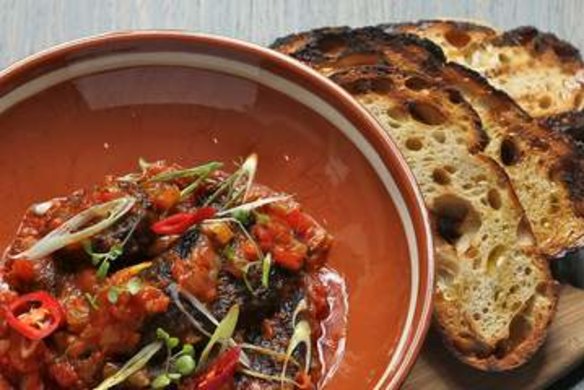 Boudin noir with tomatoes and chilli.