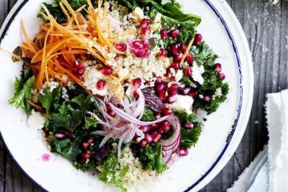 Massaged kale salad with quinoa, date and pomegranate.