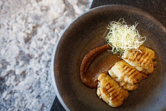 Tebasaki: Duck fat confit chicken wing with smoked miso butter.