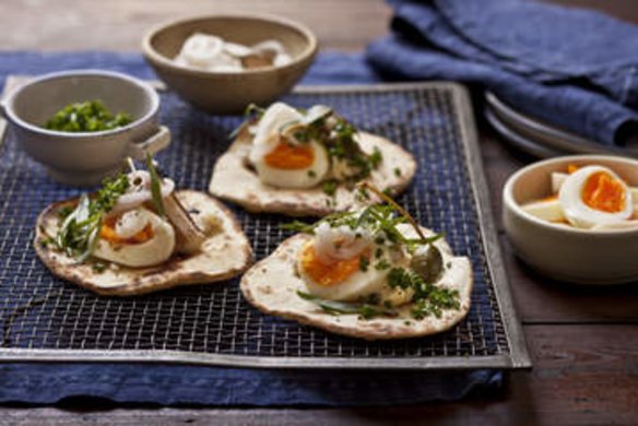 Karen Martini's Pan-fried pita with crab, egg, soft herbs & capers.