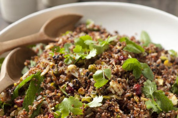 Quinoa and red rice salad with spicy cauliflower and black lentils.