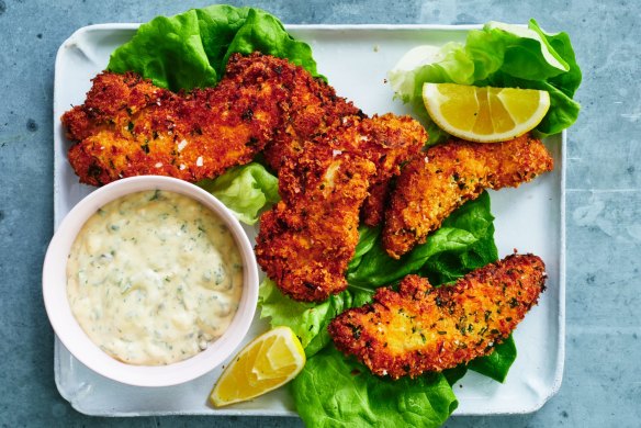 Crumbed chicken tenderloins with Creole ravigote sauce.