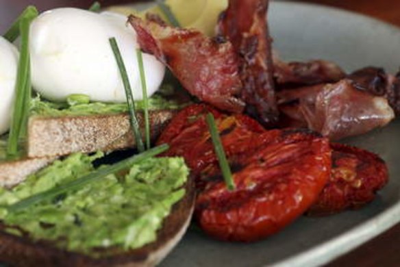 The Tuckshop breakfast combines eggs with pancetta, tomatoes, avocado and smashed peas.
