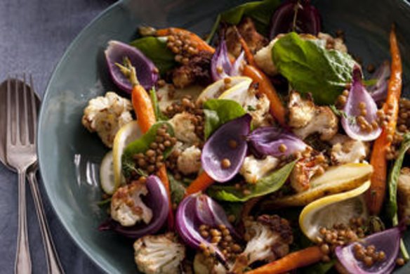 Warm roast veggie salad with lemony lentils. Jill Dupleix BREAKFAST recipes for Epicure and Good Living. Photographed by Marina Oliphant. Food preparation and styling by Caroline Velik. Bowl from Essential Ingredient, fabric from Manon bis. MUST CREDIT. Photographed March 22, 2012. The Age Newspaper and The Sydney Morning Herald.