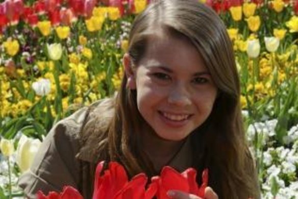 Floriade ambassador Bindi Irwin poses in a garden bed.