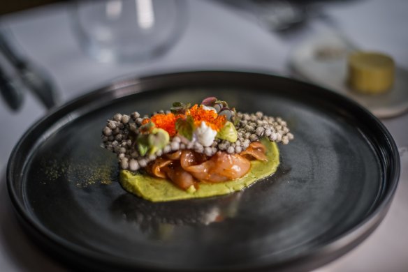 Kingfish escabeche looks like an elegant clam perched atop a bed of avocado puree