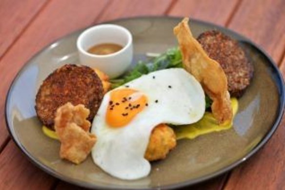 Spice-crusted white pudding with sweetcorn fritters.