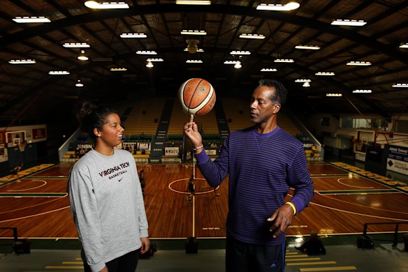 Hannah Young with her father Lewis Young, a former professional basketball player and Harlem Globetrotter, in 2012.