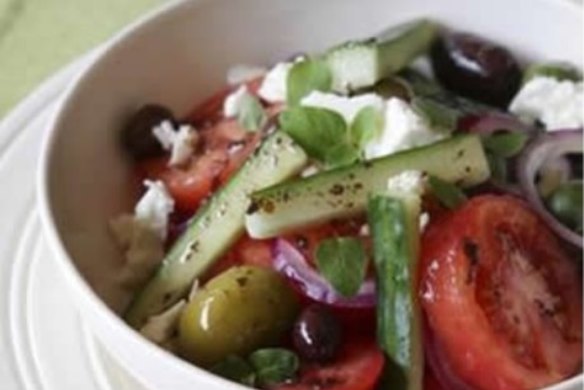 Cucumber, tomato and mixed olive salad