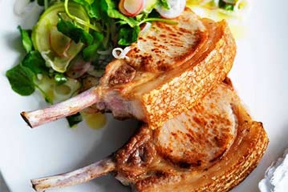 Pan-fried pork cutlets with apple, fennel and radish salad.