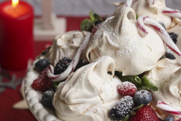 Meringues with berries and candy-cane cream.