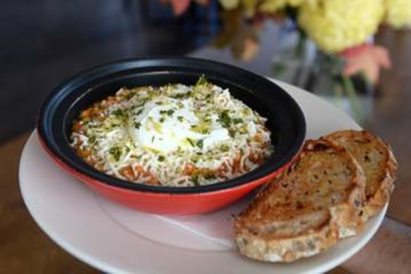 Baked beans with haloumi and gremolata.