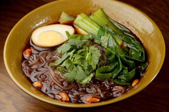 Potato noodles with an added egg served at Dainty Sichuan Noodle Express.