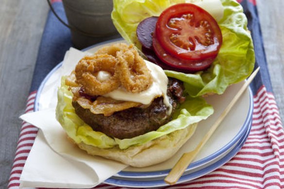 Surf and turf burger with crumbed calamari.