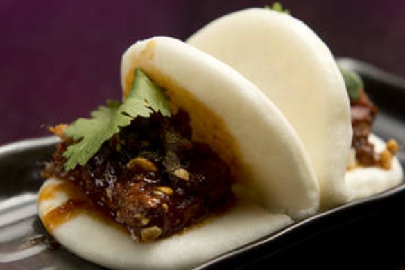 A pair of pork belly bao.