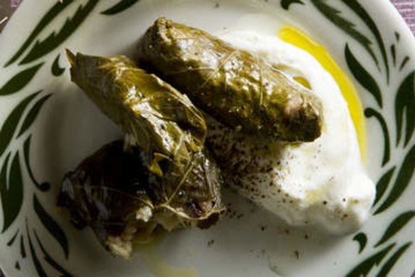Stuffed vine leaves with rice, pine nuts, currants and lemon.