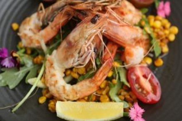 Exceptionally moreish: king prawns imbued with rosemary and barbecue corn. 