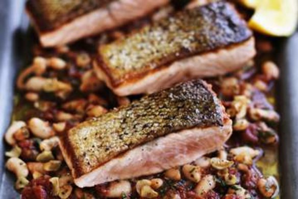 Crispy skin salmon with braised white beans.