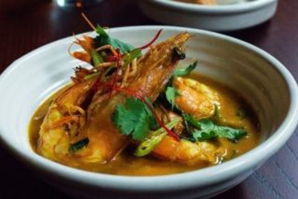 Bengali curry of king prawns, spinach, coconut and turmeric.