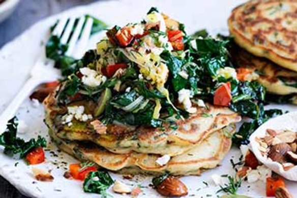 Spinach hotcakes with greens and feta.