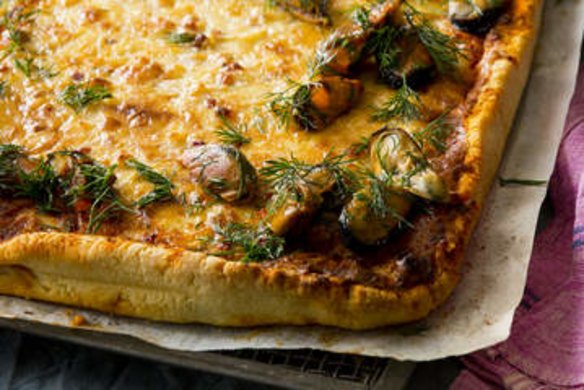 Onion, gruyere and sour cream tart with smoked mussels and dill.