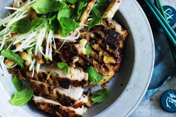 Marinated pork cutlets with green papaya salad.